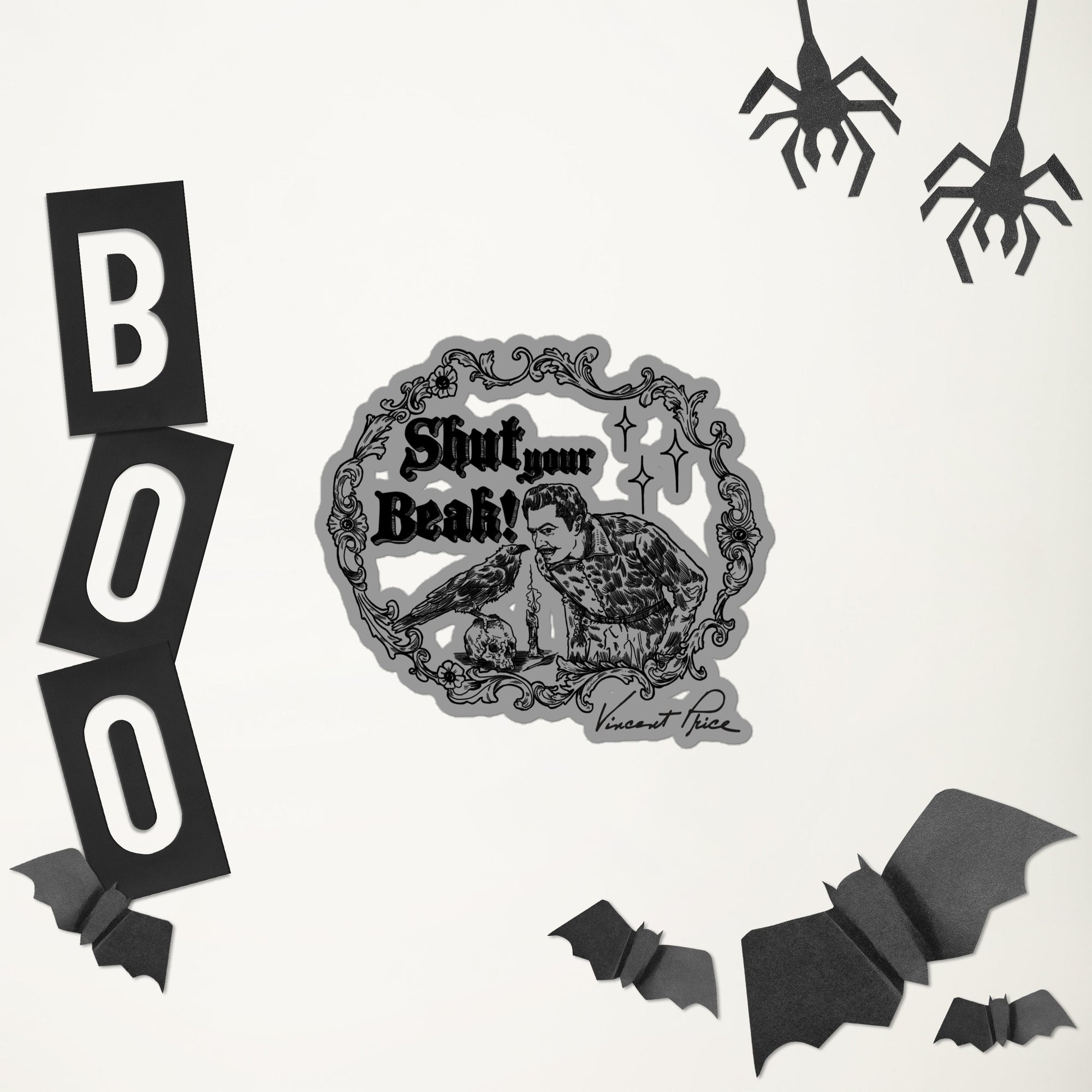 Halloween-themed decorations including 'BOO' letters, spider webs, and bats on a white background.