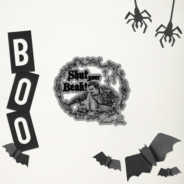 Halloween-themed decorations including 'BOO' letters, spider webs, and bats on a white background.