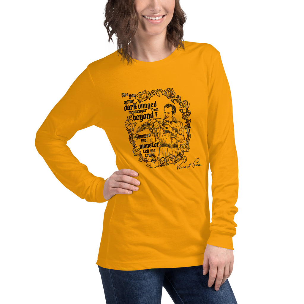 Person wearing a yellow long-sleeve shirt with graphic design and text.