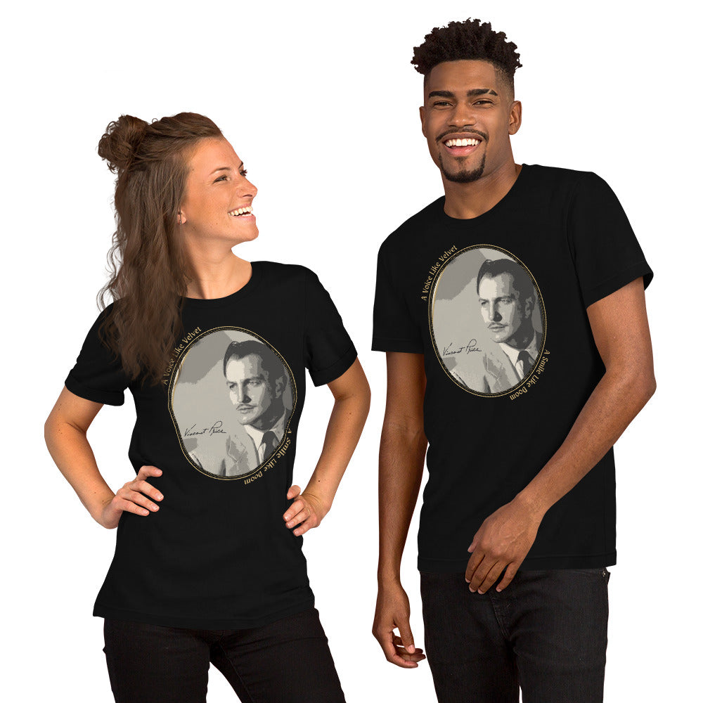 Two people wearing black t-shirts with a graphic of a man's face on a white background