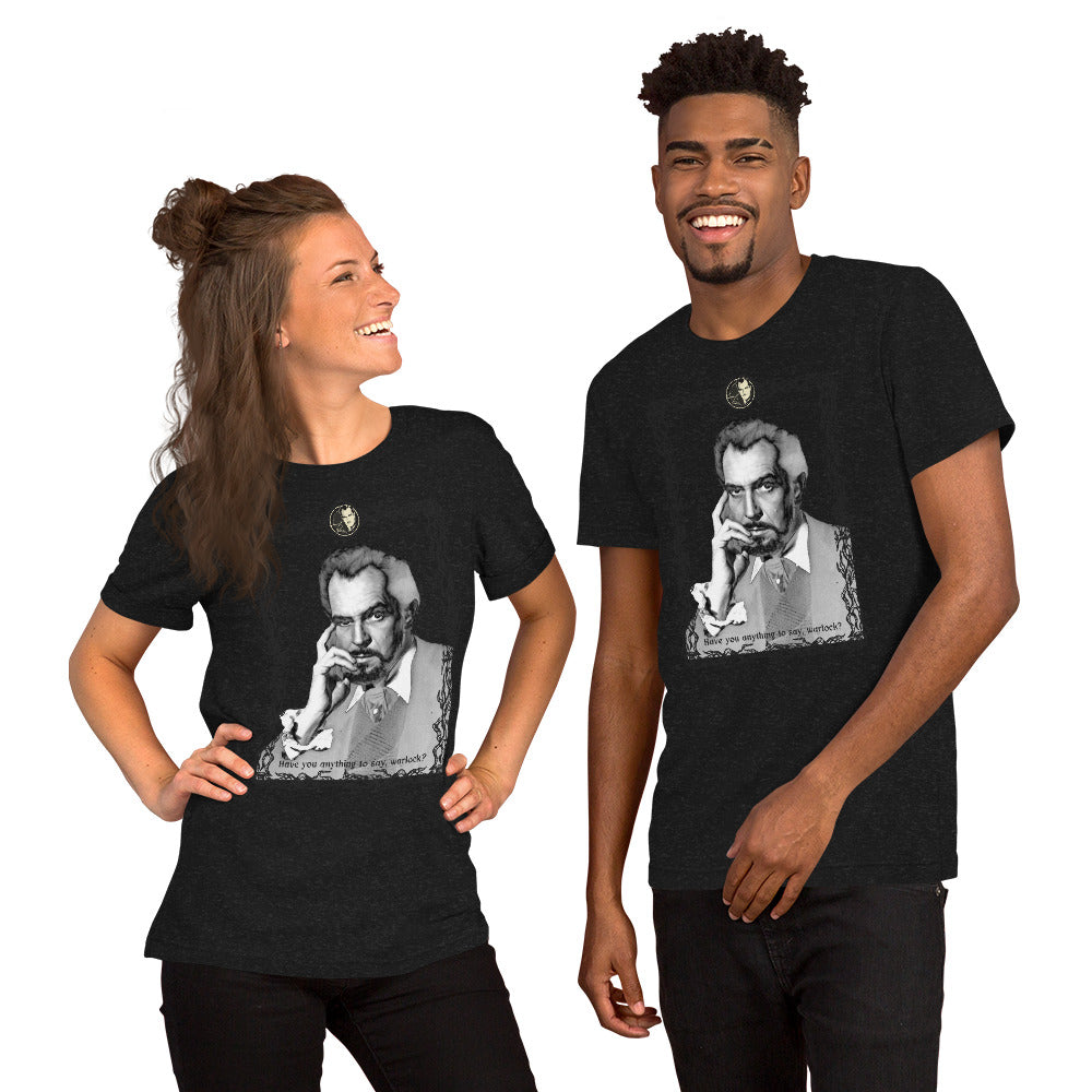 A man and a woman smiling, wearing a black t-shirt with a grayscale illustration of a person in the center.